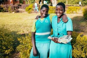 Uganda: High school scholarship program for orphans striving toward sustainability thanks to tuition-paying students; recent harvest success